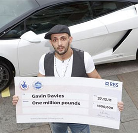 The Cage Fighter Gavin Davies and His Prize from the Lottery